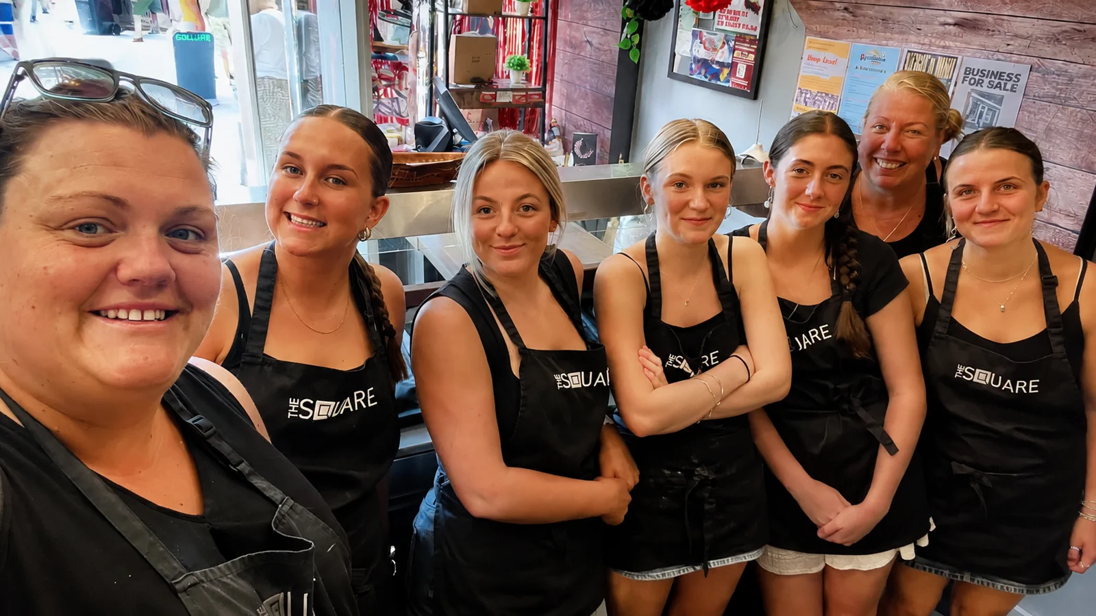 The Square team inside the shop
